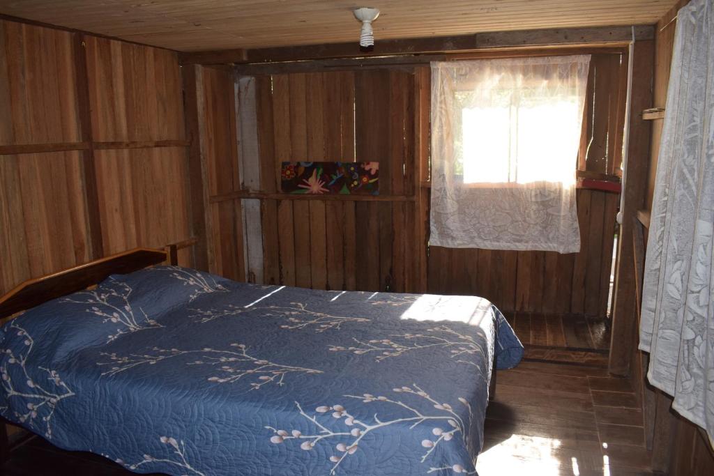 Postel nebo postele na pokoji v ubytování Casa Hospedaje Tingomaria