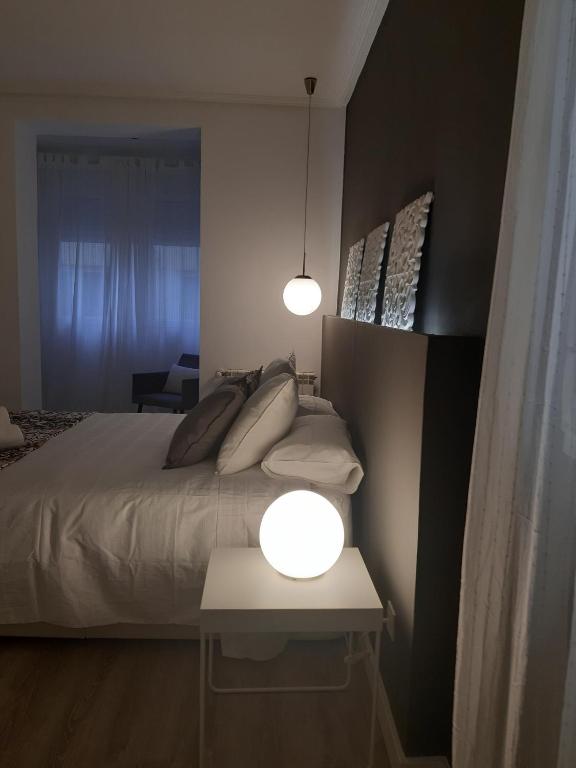 A bed or beds in a room at La parada de Conde Aranda