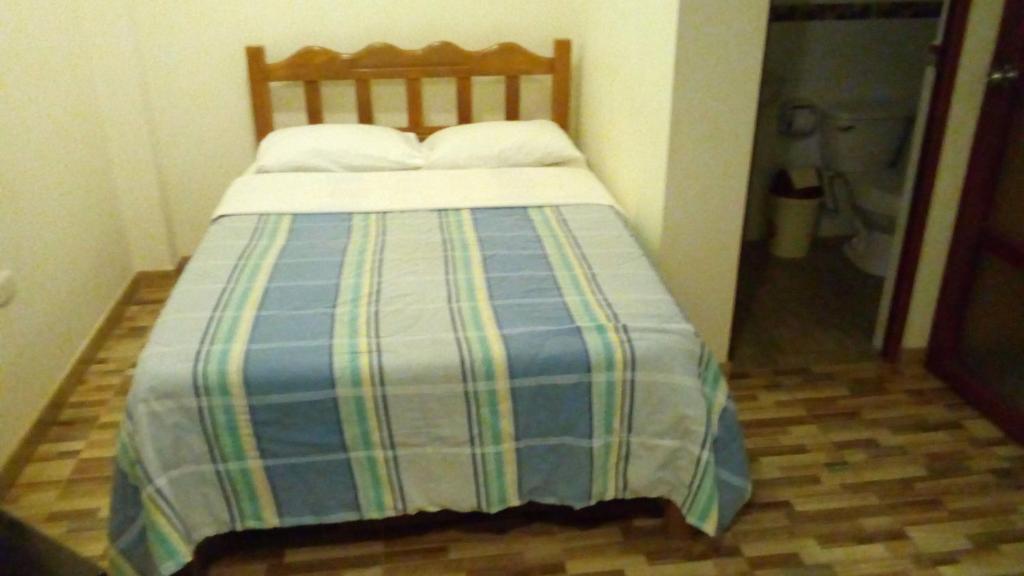 Postel nebo postele na pokoji v ubytování Posada Gino