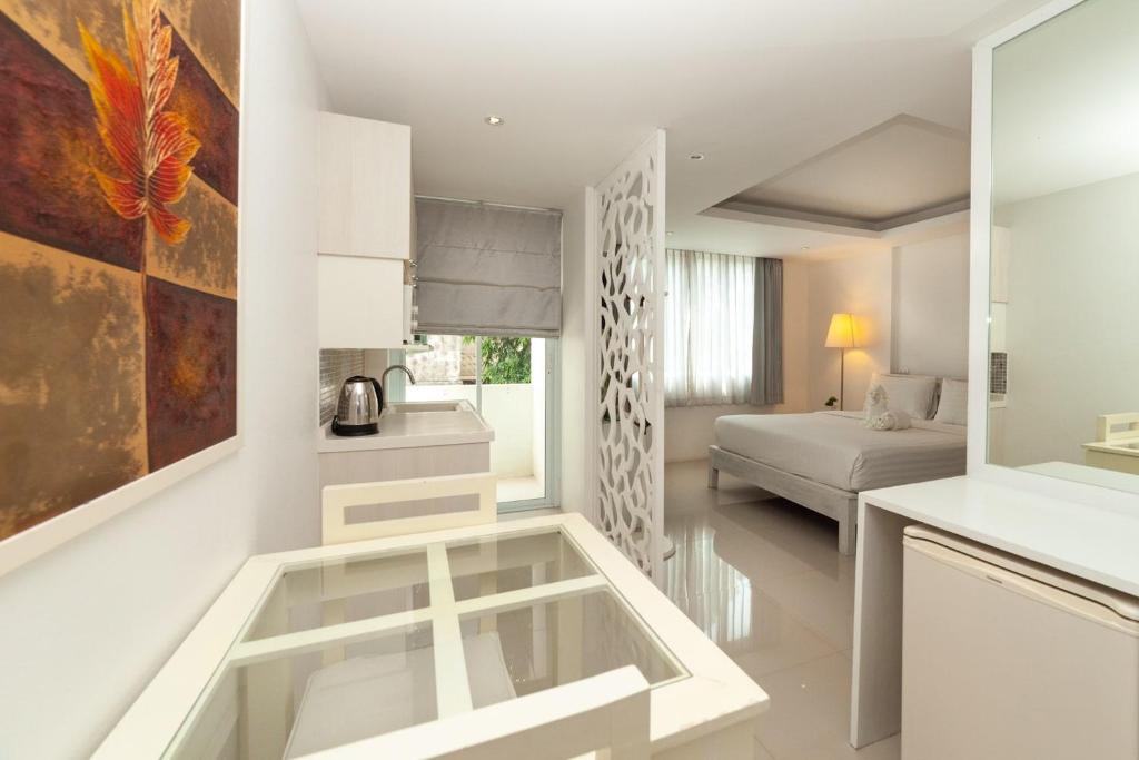 Kuchyň nebo kuchyňský kout v ubytování Baanpoon Apartment
