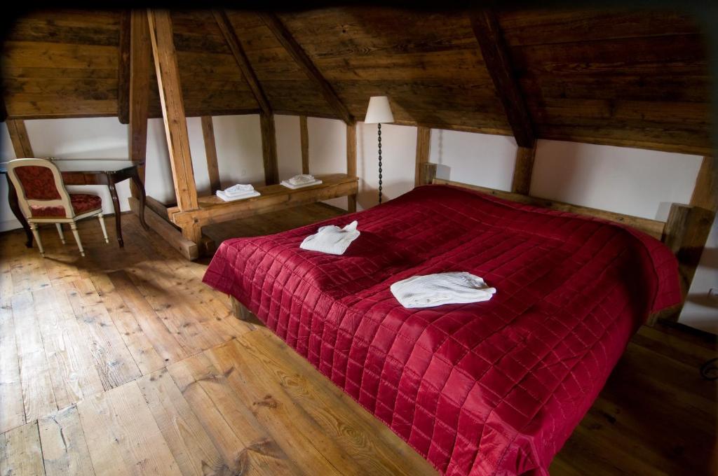Postel nebo postele na pokoji v ubytování Zamek Zabreh