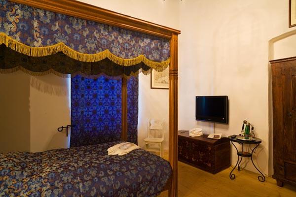 Postel nebo postele na pokoji v ubytování Zamek Zabreh