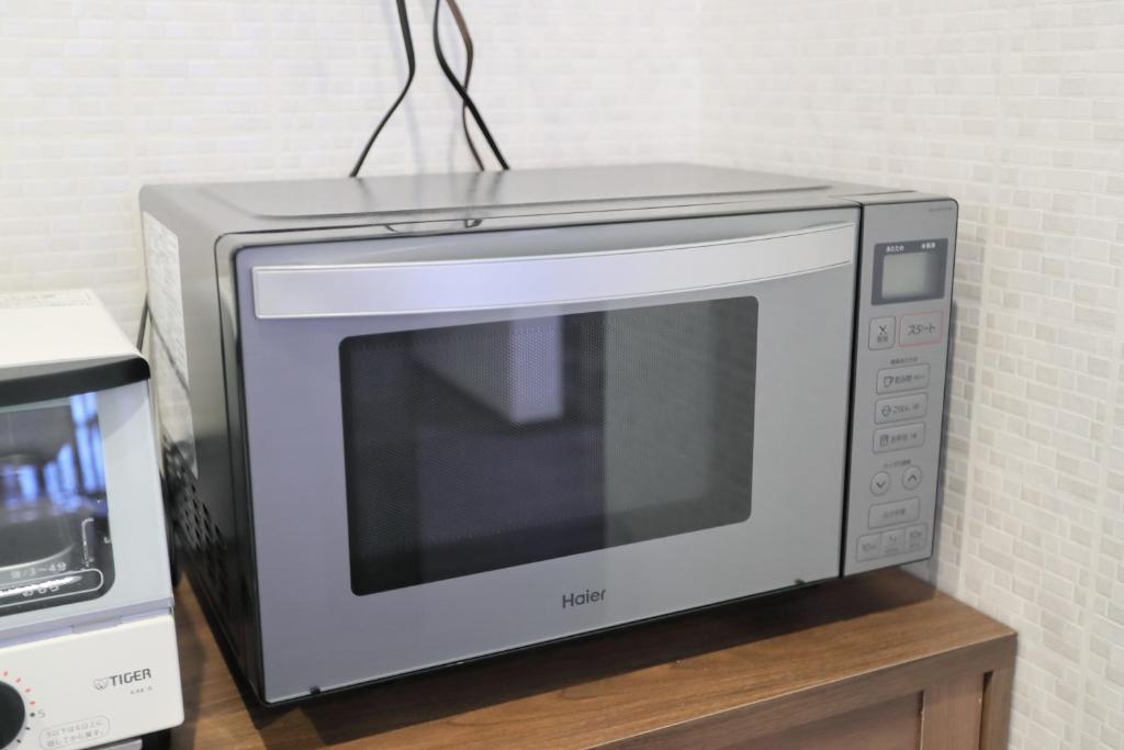 Kuchyň nebo kuchyňský kout v ubytování Villa Ikebukuro