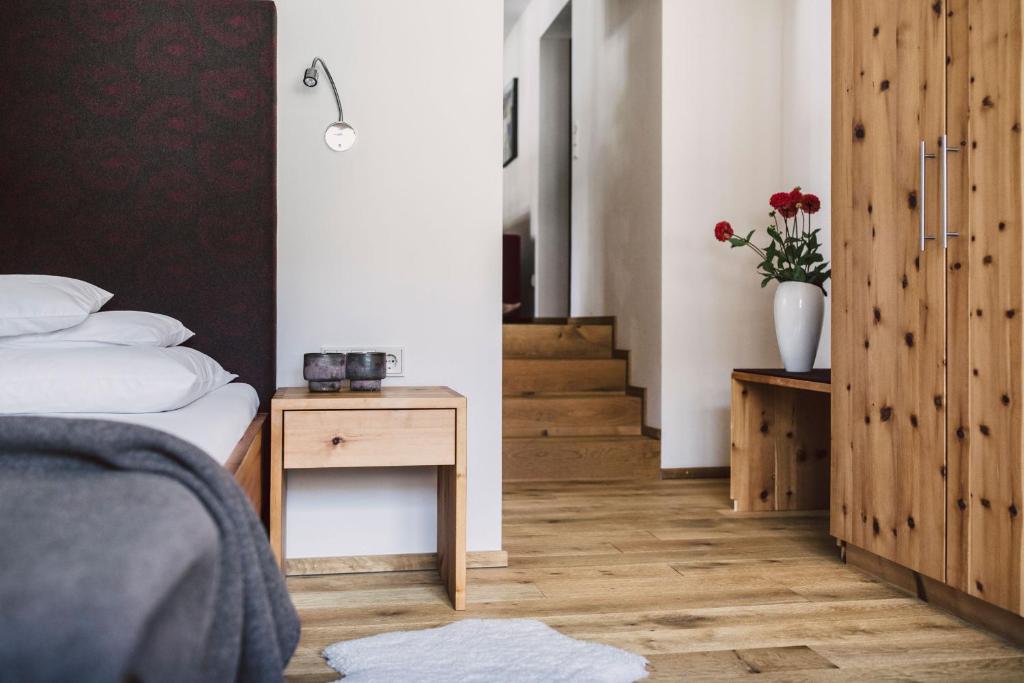 Postel nebo postele na pokoji v ubytování Hotel Alpenrose