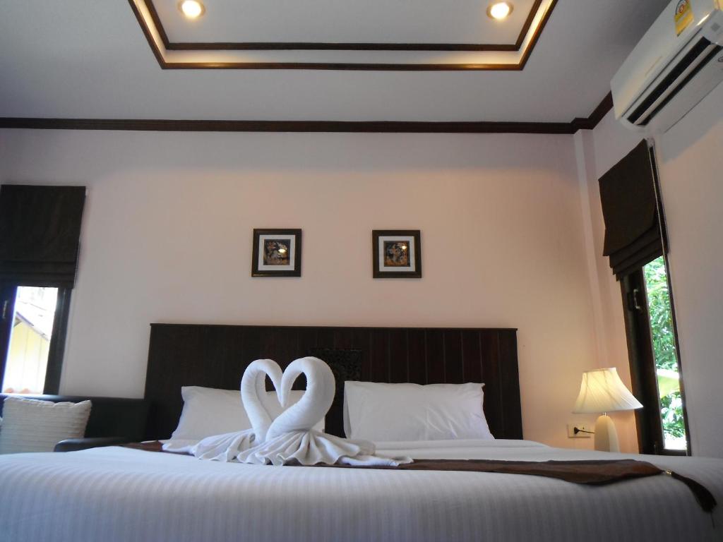 Postel nebo postele na pokoji v ubytování Seabreeze Hotel Kohchang