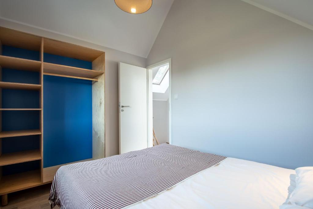 Postel nebo postele na pokoji v ubytování Domy Apartamentowe - Na Makowej