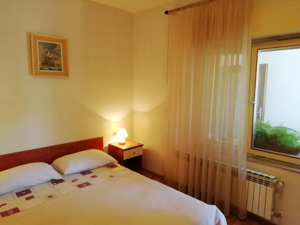 Posteľ alebo postele v izbe v ubytovaní Apartments Jadranka Ivana Pula