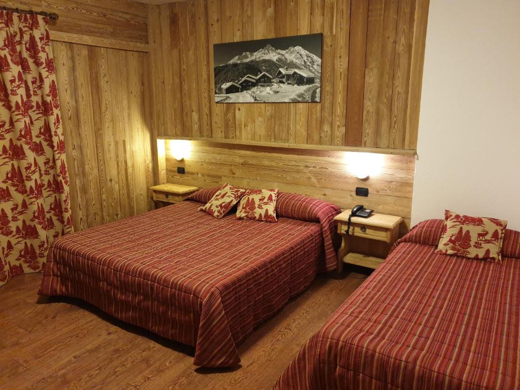 Postel nebo postele na pokoji v ubytování Hotel Rendez-Vous - Aymavilles