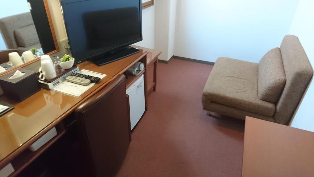 TV a/nebo společenská místnost v ubytování Kuretake-Inn Iwata