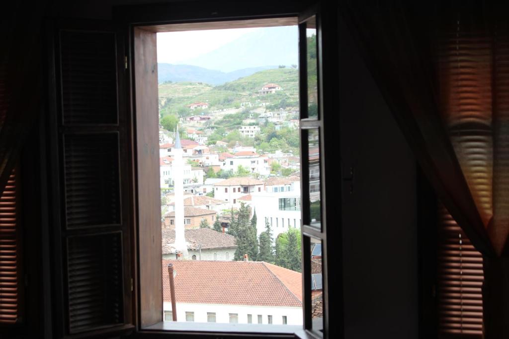 a view from a window of a city at Guesthouse Arjan in Berat