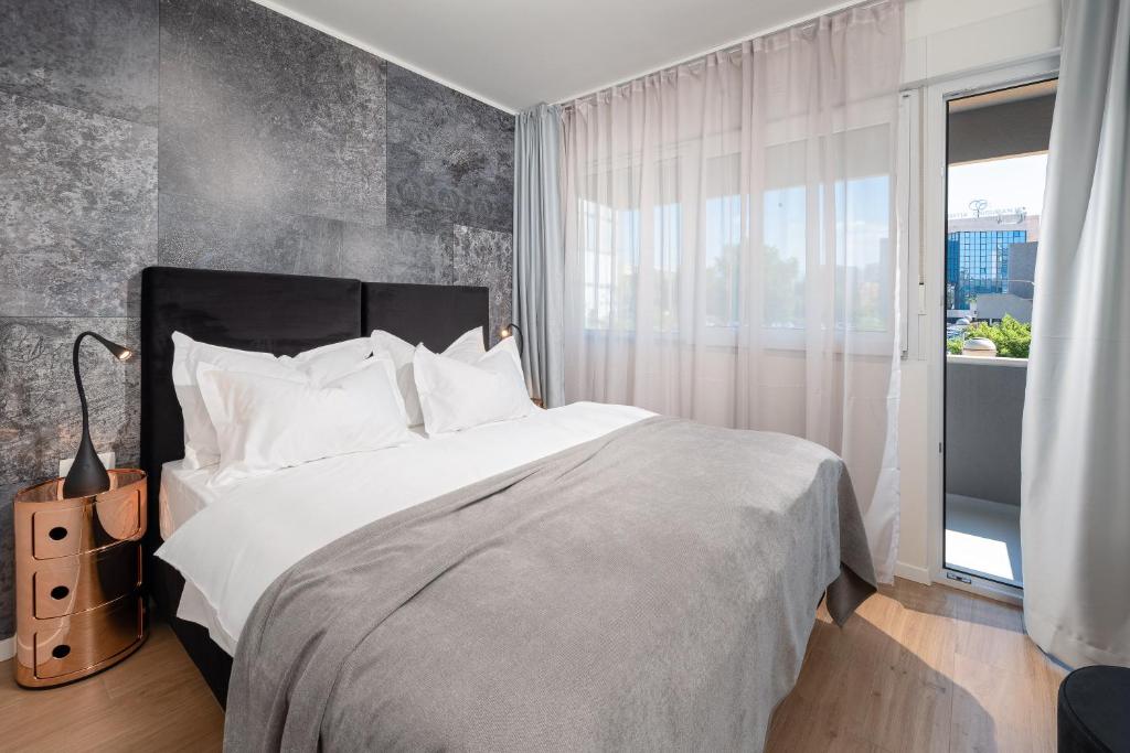 Postel nebo postele na pokoji v ubytování Skaline Luxury rooms Split