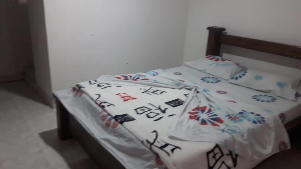 Postel nebo postele na pokoji v ubytování Hotel El Triangulo