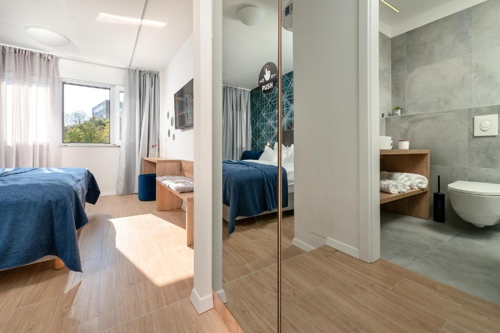 Postel nebo postele na pokoji v ubytování Skaline Luxury rooms Split