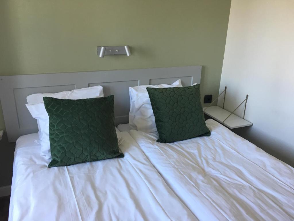Postel nebo postele na pokoji v ubytování Hotell Apladalen i Värnamo