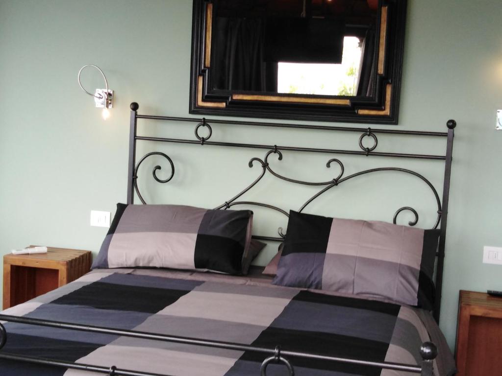 Postel nebo postele na pokoji v ubytování B&B La Forcella