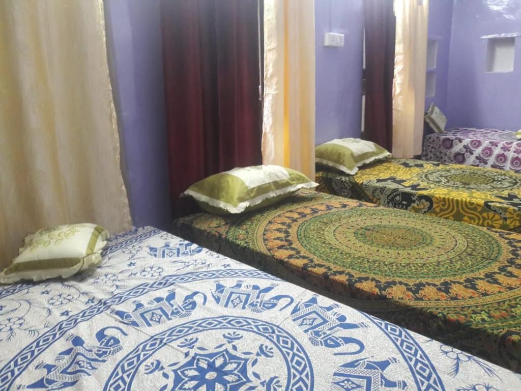 Postel nebo postele na pokoji v ubytování Mother Hostel