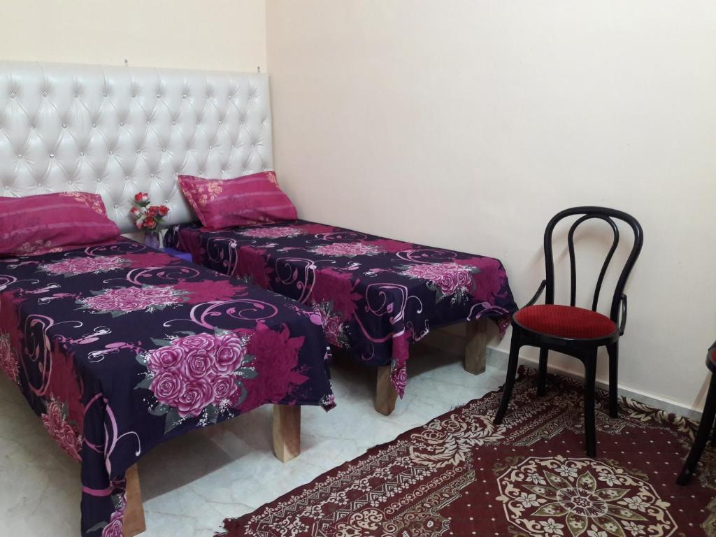 Postel nebo postele na pokoji v ubytování Mother Hostel