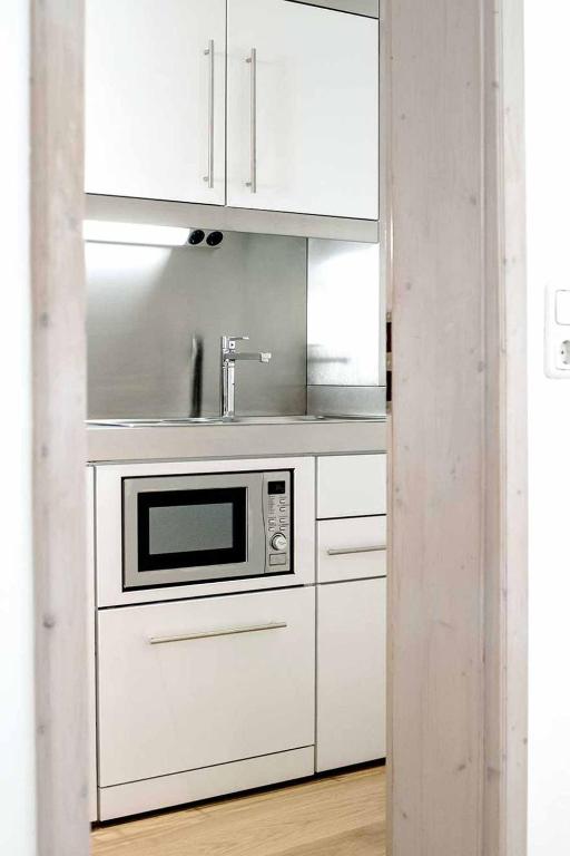 Kuchyň nebo kuchyňský kout v ubytování Hästens Boutique Biohotel - chez Douverne