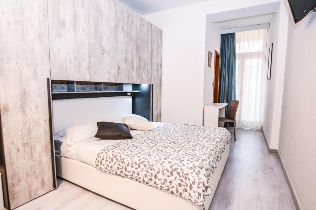 Posteľ alebo postele v izbe v ubytovaní Hotel Gardesana