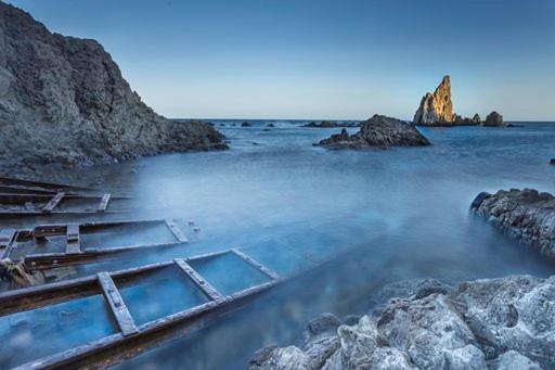 a large body of water with rocks in it at Santuario San José in San José