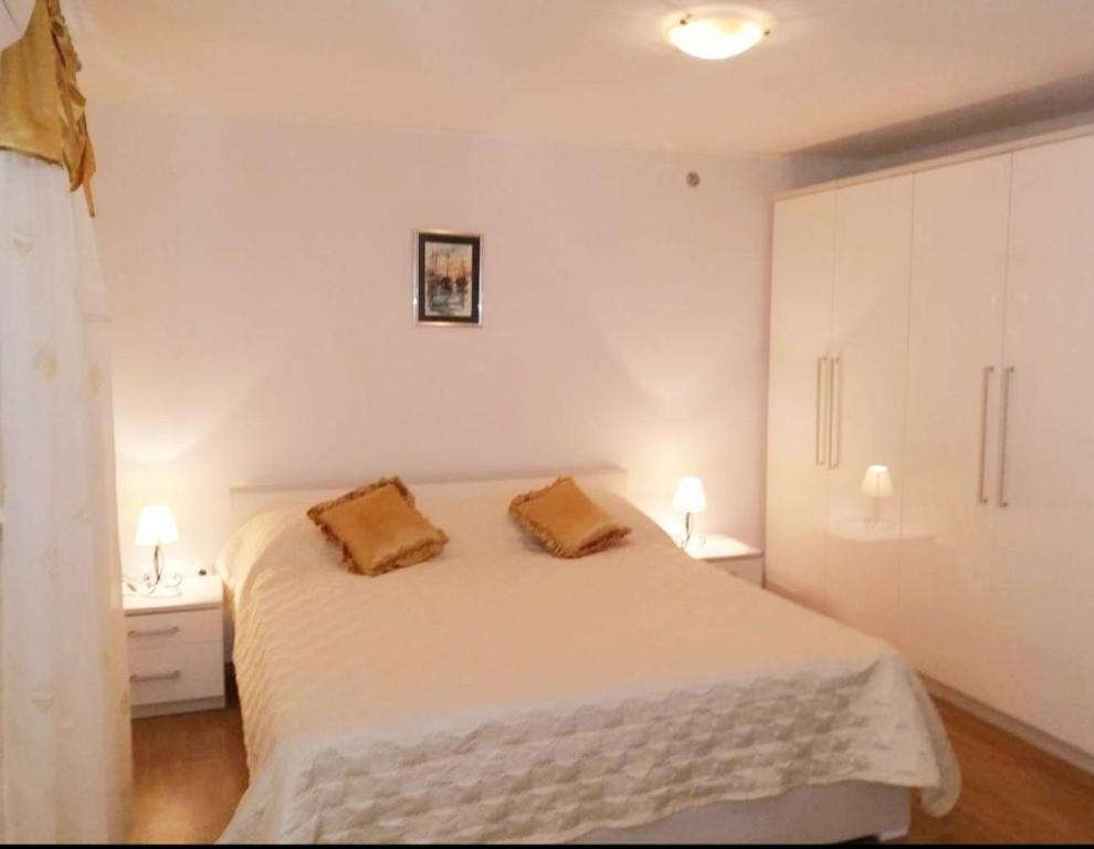Posteľ alebo postele v izbe v ubytovaní Apartman Perina