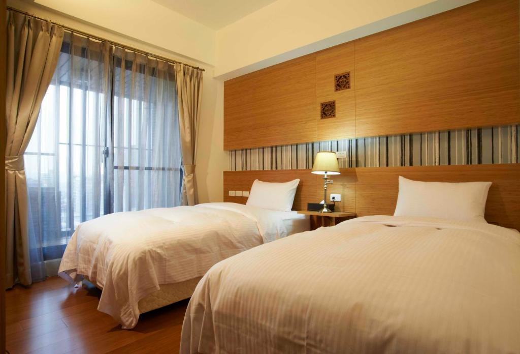 Postel nebo postele na pokoji v ubytování Master Hotel