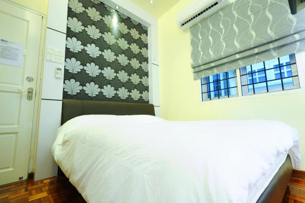 Letto o letti in una camera di The One Vacation Home