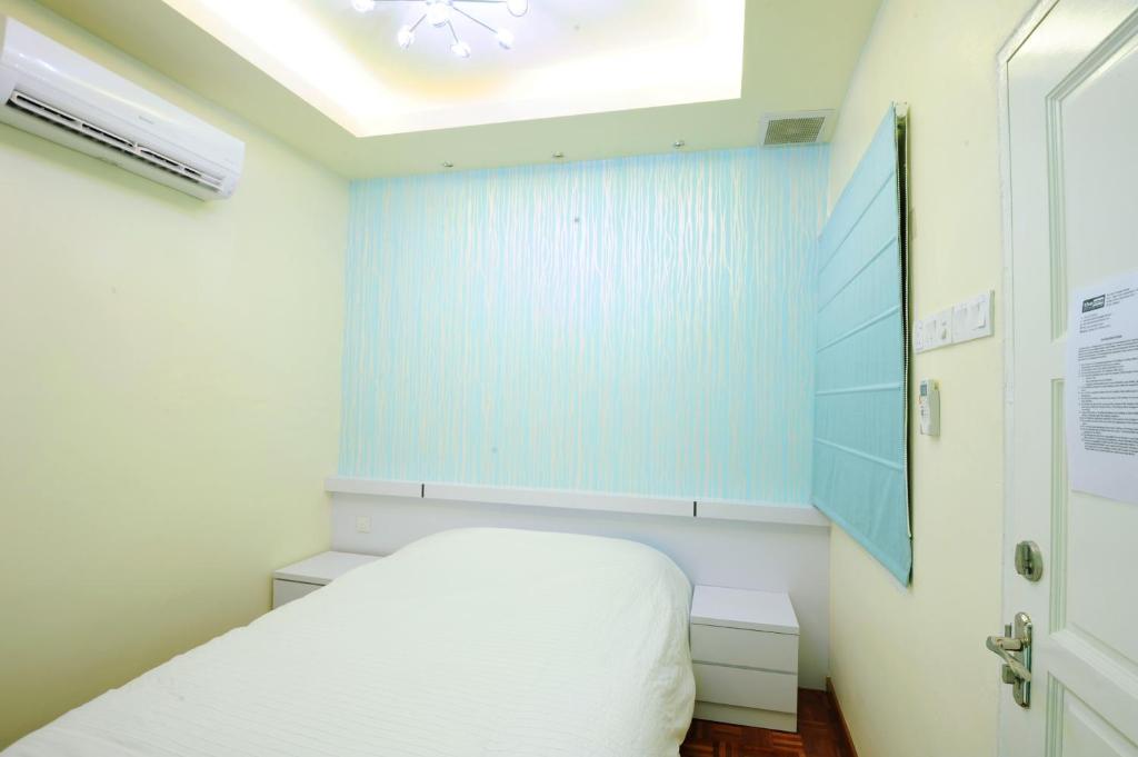 Letto o letti in una camera di The One Vacation Home