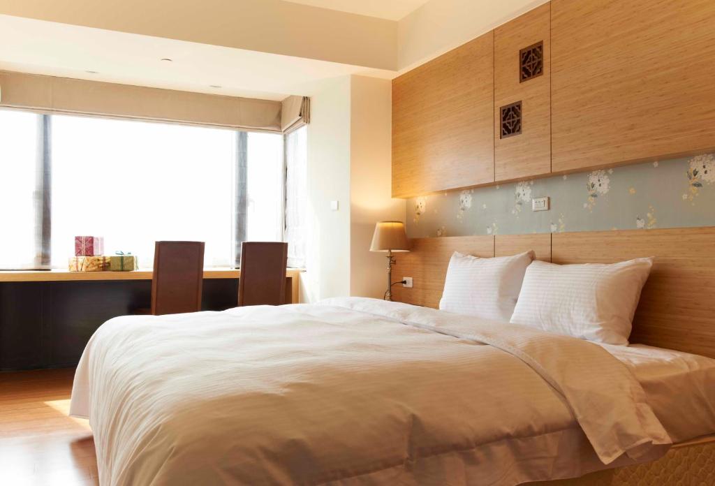 Postel nebo postele na pokoji v ubytování Master Hotel