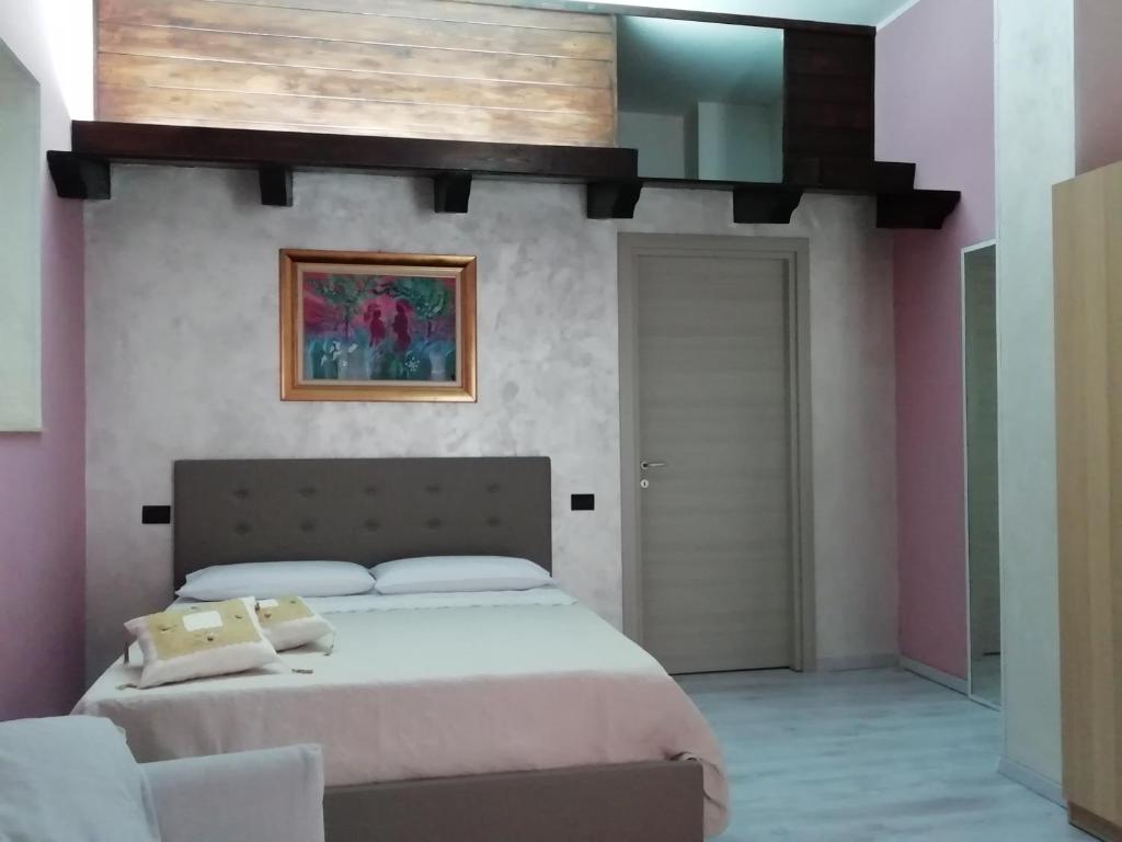 Llit o llits en una habitació de Mattei Domus
