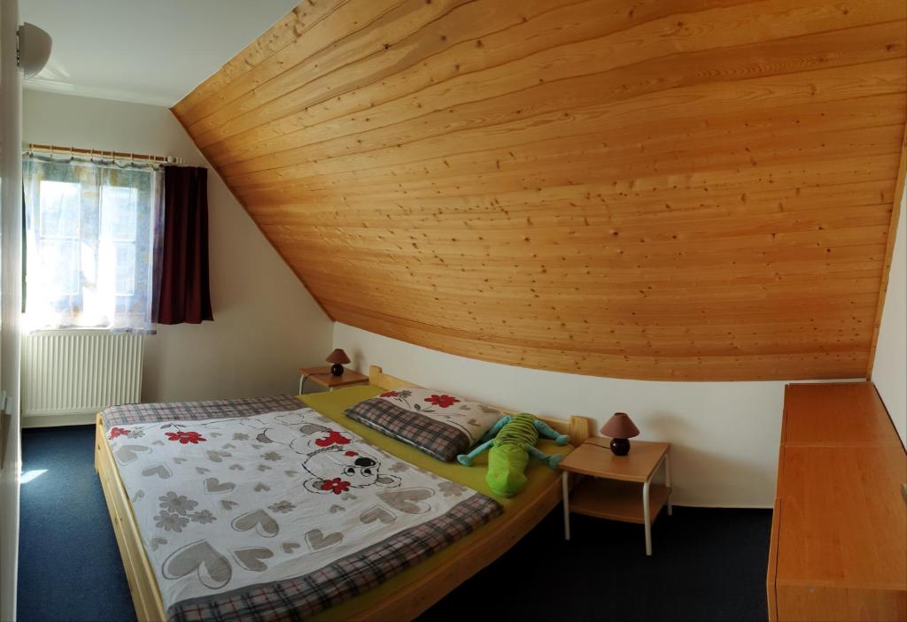 Postel nebo postele na pokoji v ubytování Happy Chalet