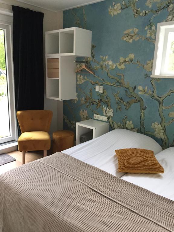 Postel nebo postele na pokoji v ubytování Hotel Jans