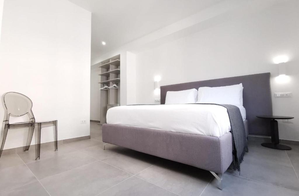 Posteľ alebo postele v izbe v ubytovaní SuitesGaribaldi