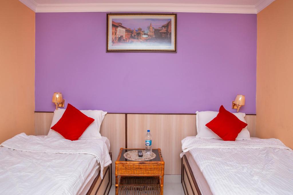 Postel nebo postele na pokoji v ubytování Hotel Tranquil