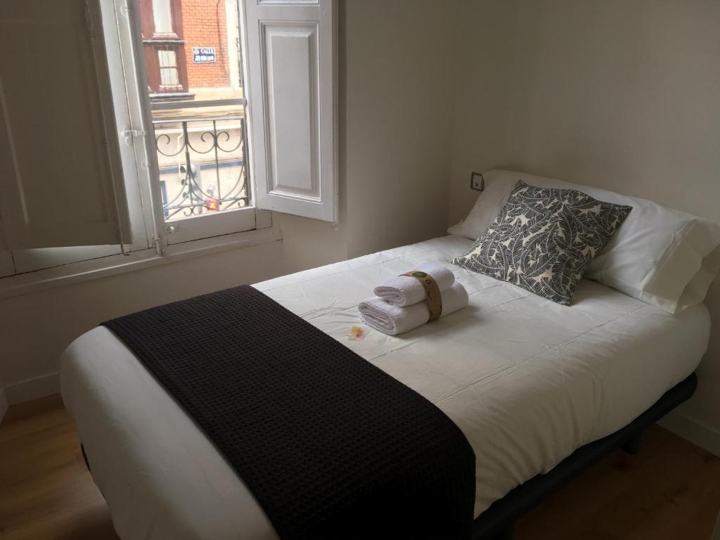 Postel nebo postele na pokoji v ubytování INSIDEHOME Valladolid Centro -Hab con baño privado en el centro y OPCION DE PARKING-