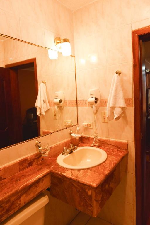 Koupelna v ubytování Hotel Makroz
