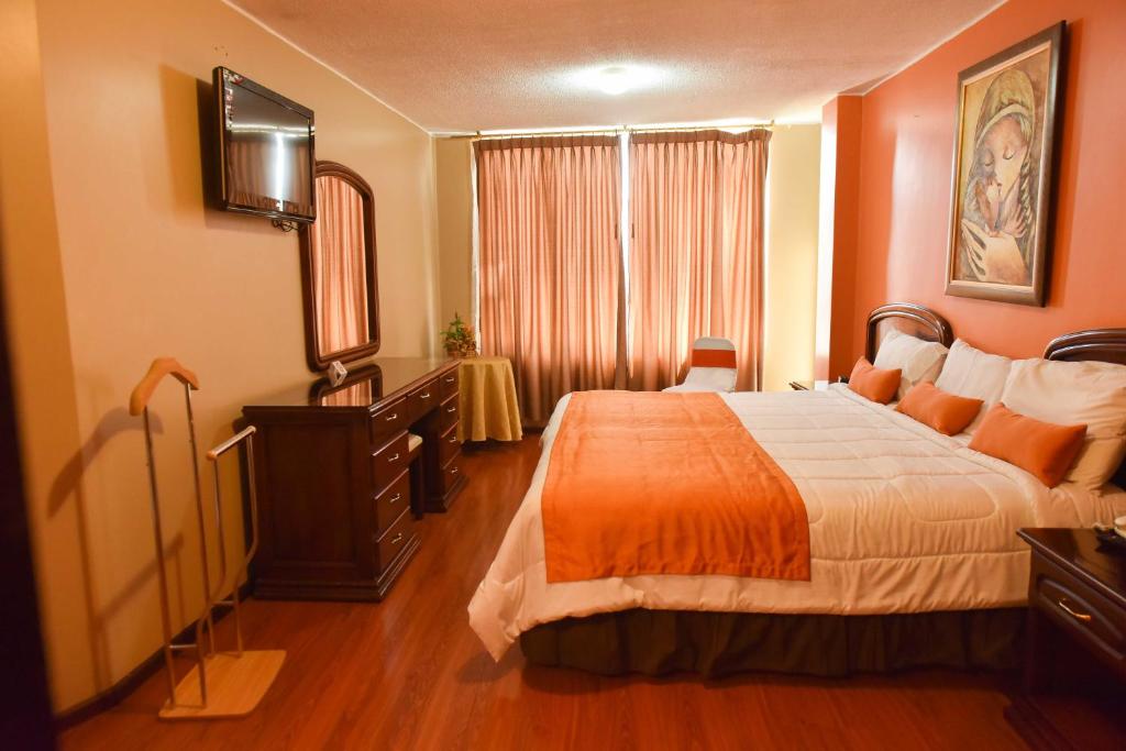 Postel nebo postele na pokoji v ubytování Hotel Makroz