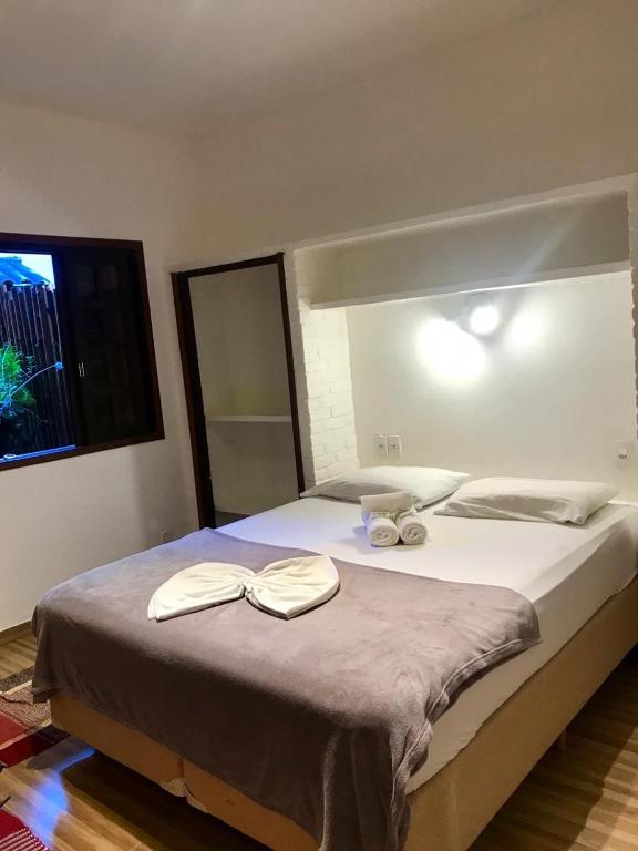 Postel nebo postele na pokoji v ubytování Biergarten Suites