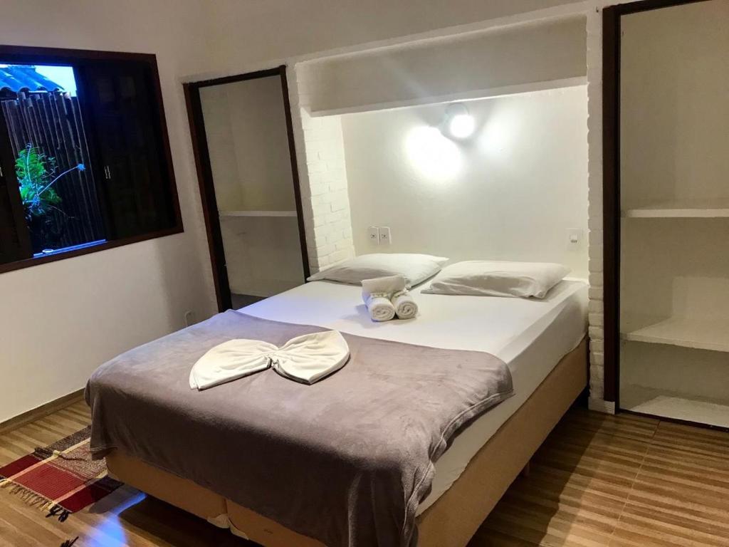 Postel nebo postele na pokoji v ubytování Biergarten Suites