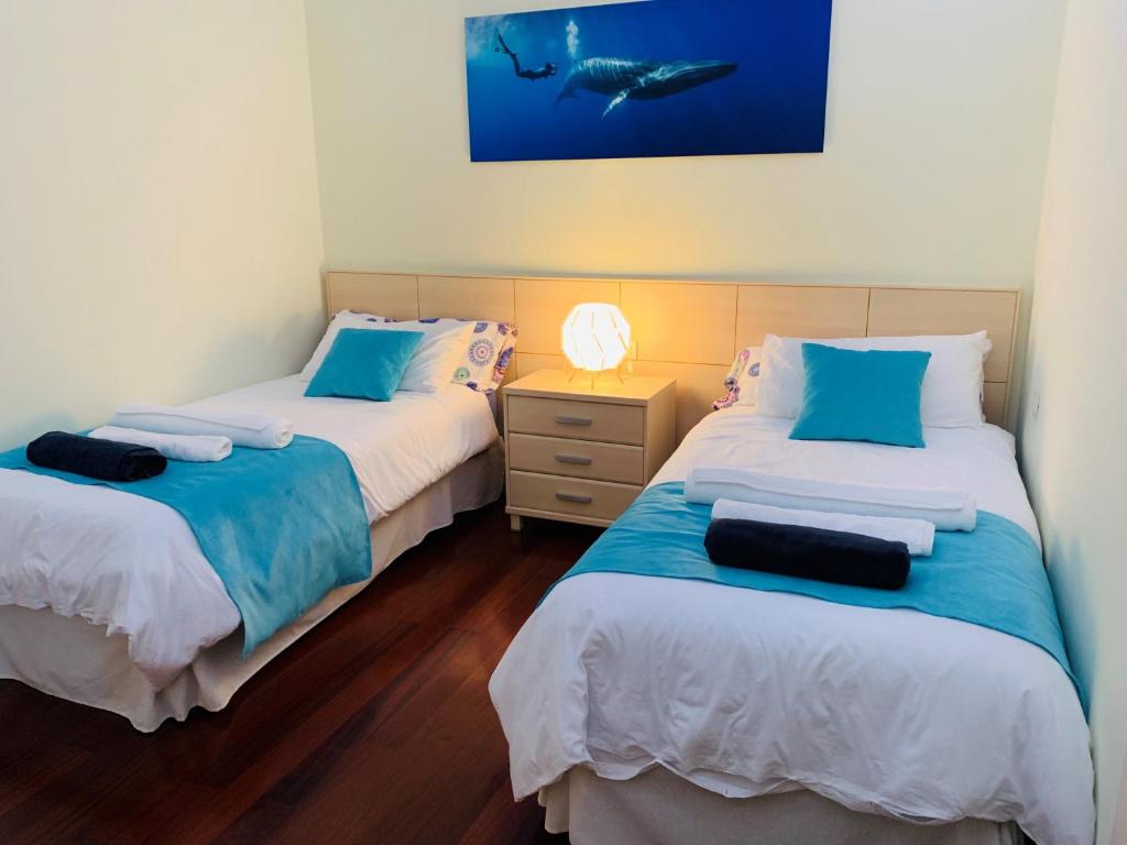 Posteľ alebo postele v izbe v ubytovaní Villa OCEAN Infinity heated pool optional