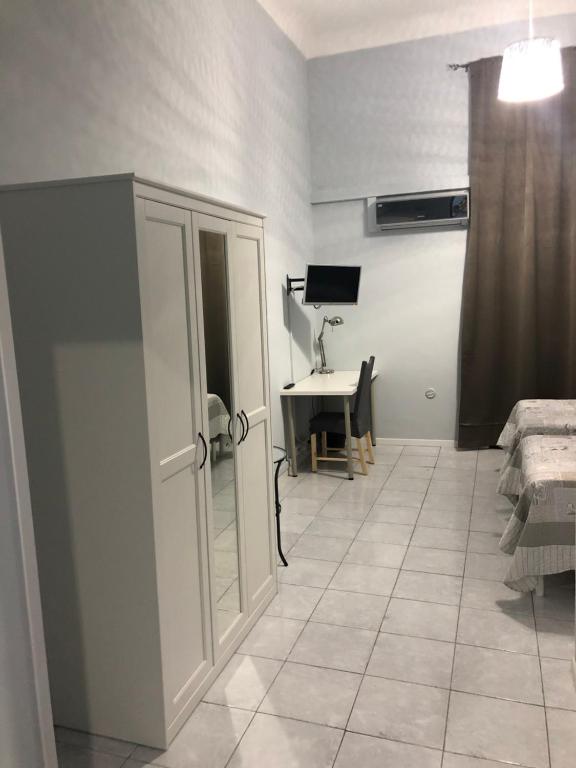 Telewizja i/lub zestaw kina domowego w obiekcie Affittacamere Roma