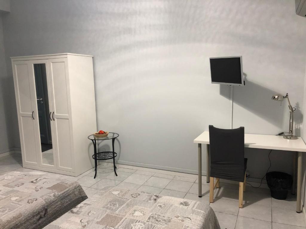 Łóżko lub łóżka w pokoju w obiekcie Affittacamere Roma