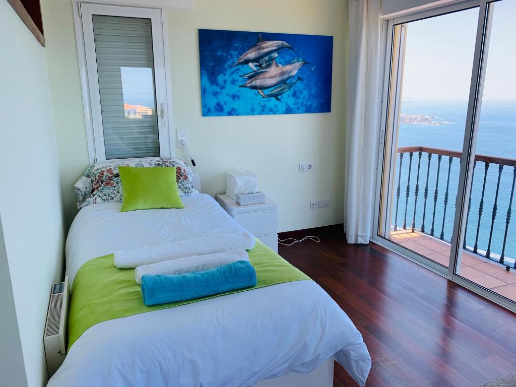 Posteľ alebo postele v izbe v ubytovaní Villa OCEAN Infinity heated pool optional