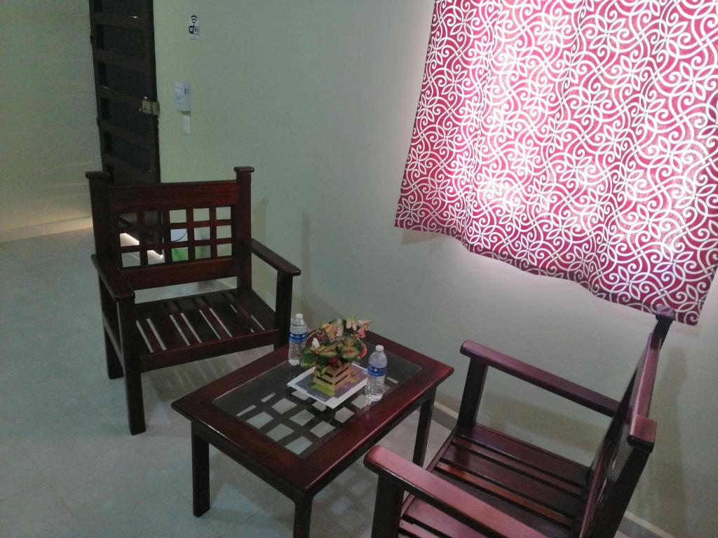 Posezení v ubytování HOTEL VILLA CALAKMUL