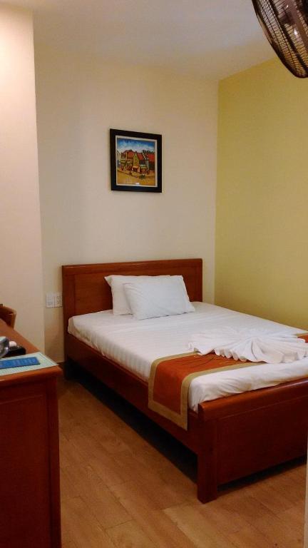 Giường trong phòng chung tại Tabii hotel