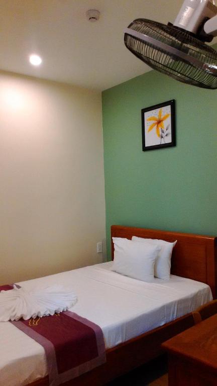 Postel nebo postele na pokoji v ubytování Tabii hotel