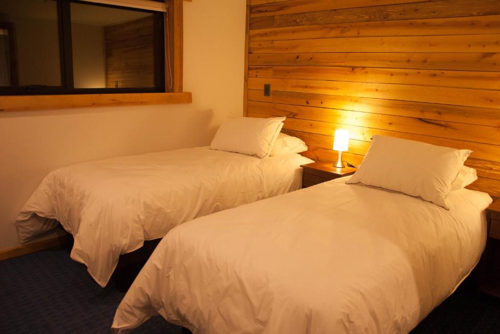 Postelja oz. postelje v sobi nastanitve Las Bravas Lodge