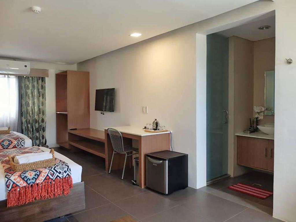 TV a/nebo společenská místnost v ubytování Treetop Suites