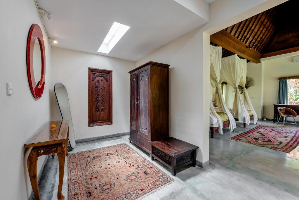 Postel nebo postele na pokoji v ubytování Villa Bodhi