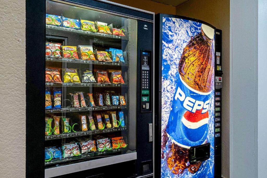 a vending machine filled with lots of drinks and soda at Quality Inn & Suites in Robbinsville